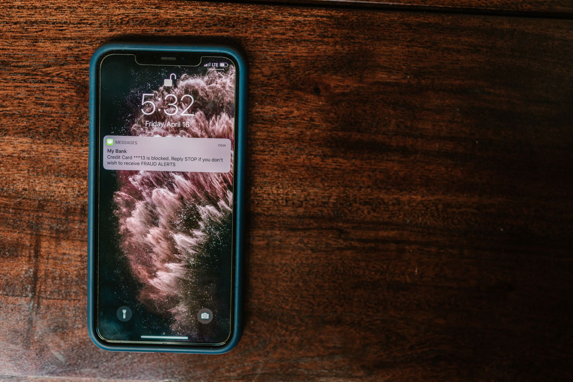 A close-up of a smartphone displaying an alert notification, representing the moment of realizing you accidentally unfollowed someone on Instagram