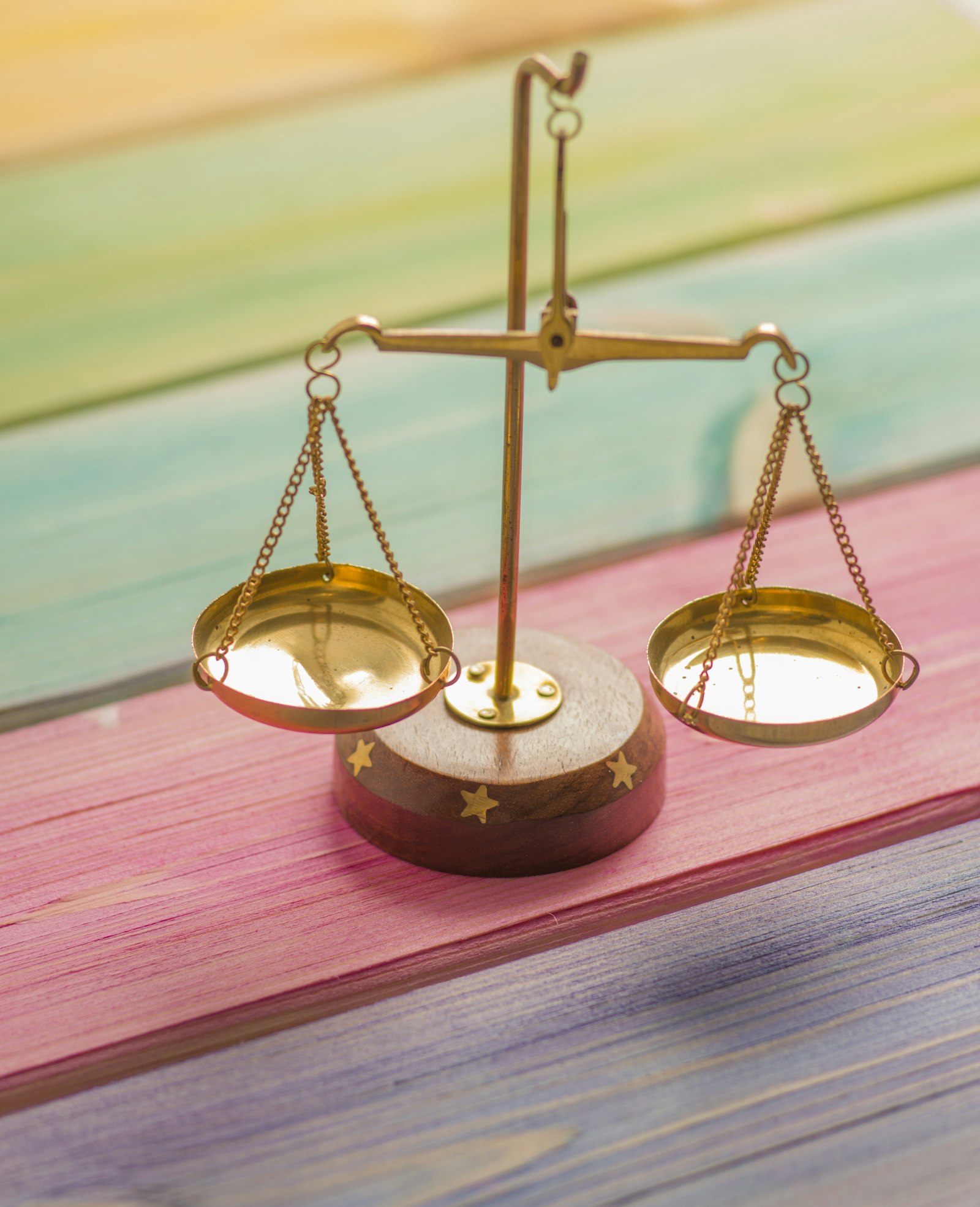 A small brass balance scale with two pans, representing the Instagram follower-to-following ratio