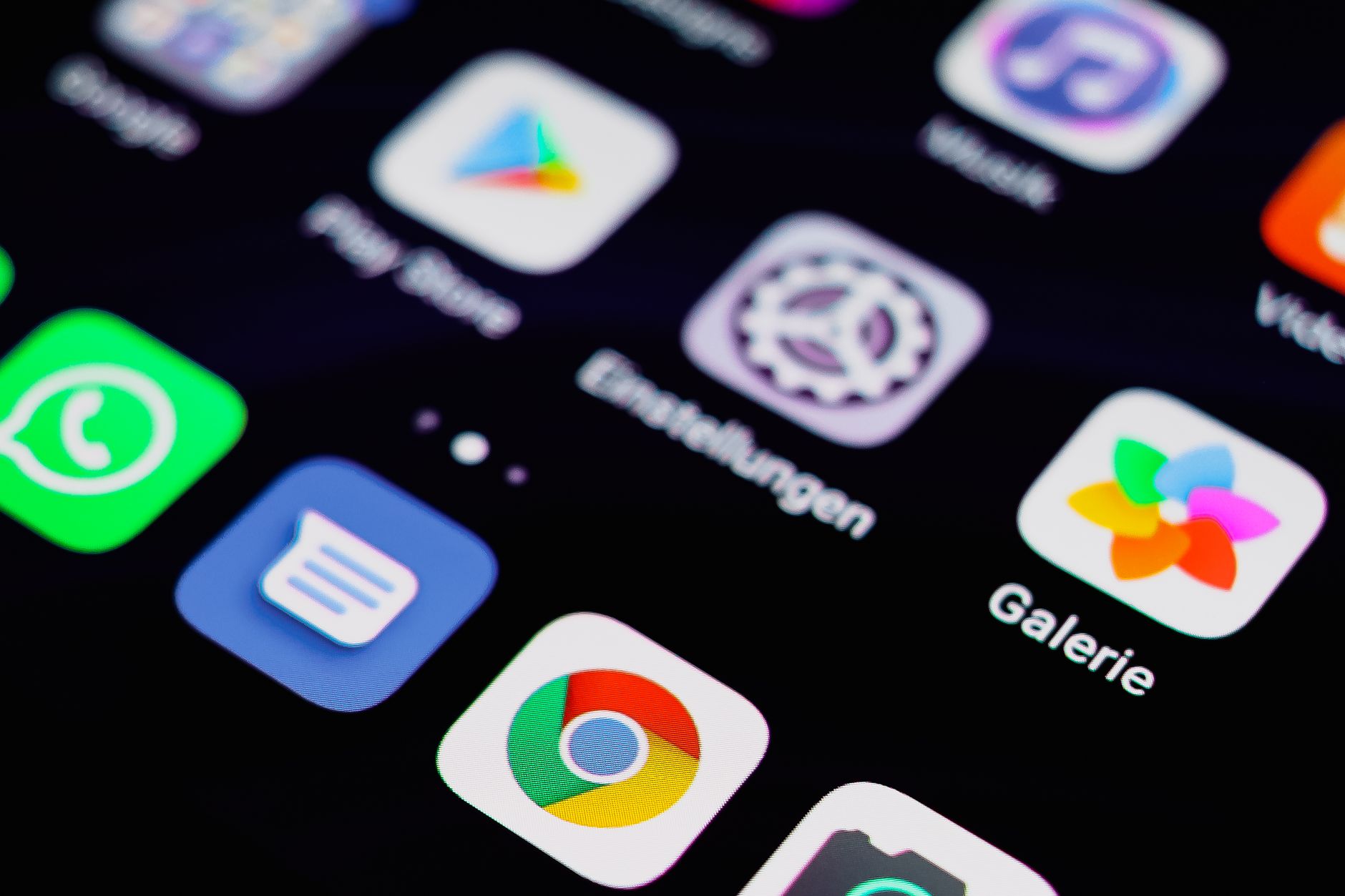 A close-up of a smartphone screen showing a grid of app icons, representing the search for a free app to see who unfollowed you on Instagram
