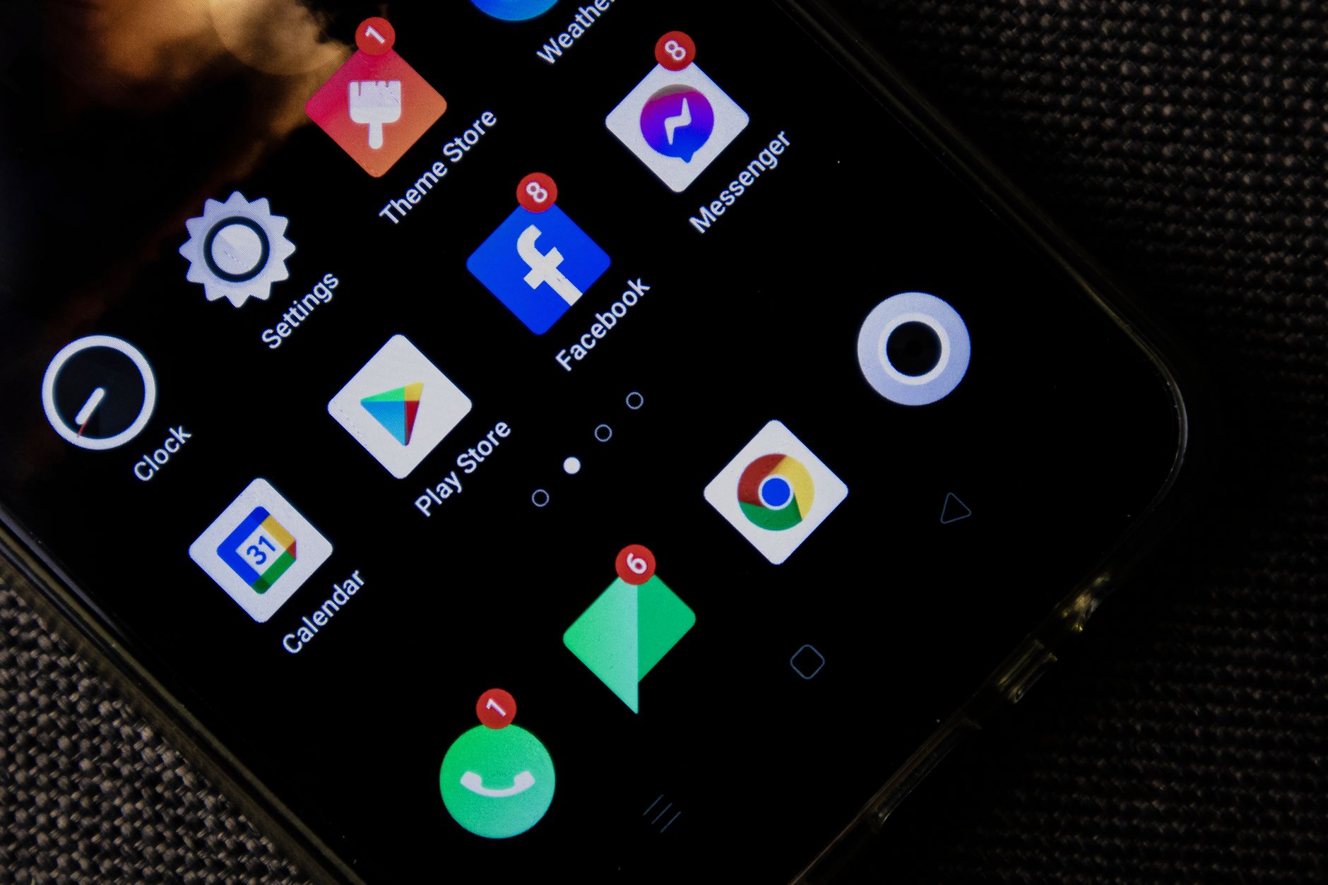 A close-up of a smartphone screen showing social media app icons, representing the 2026 Instagram mass account purge