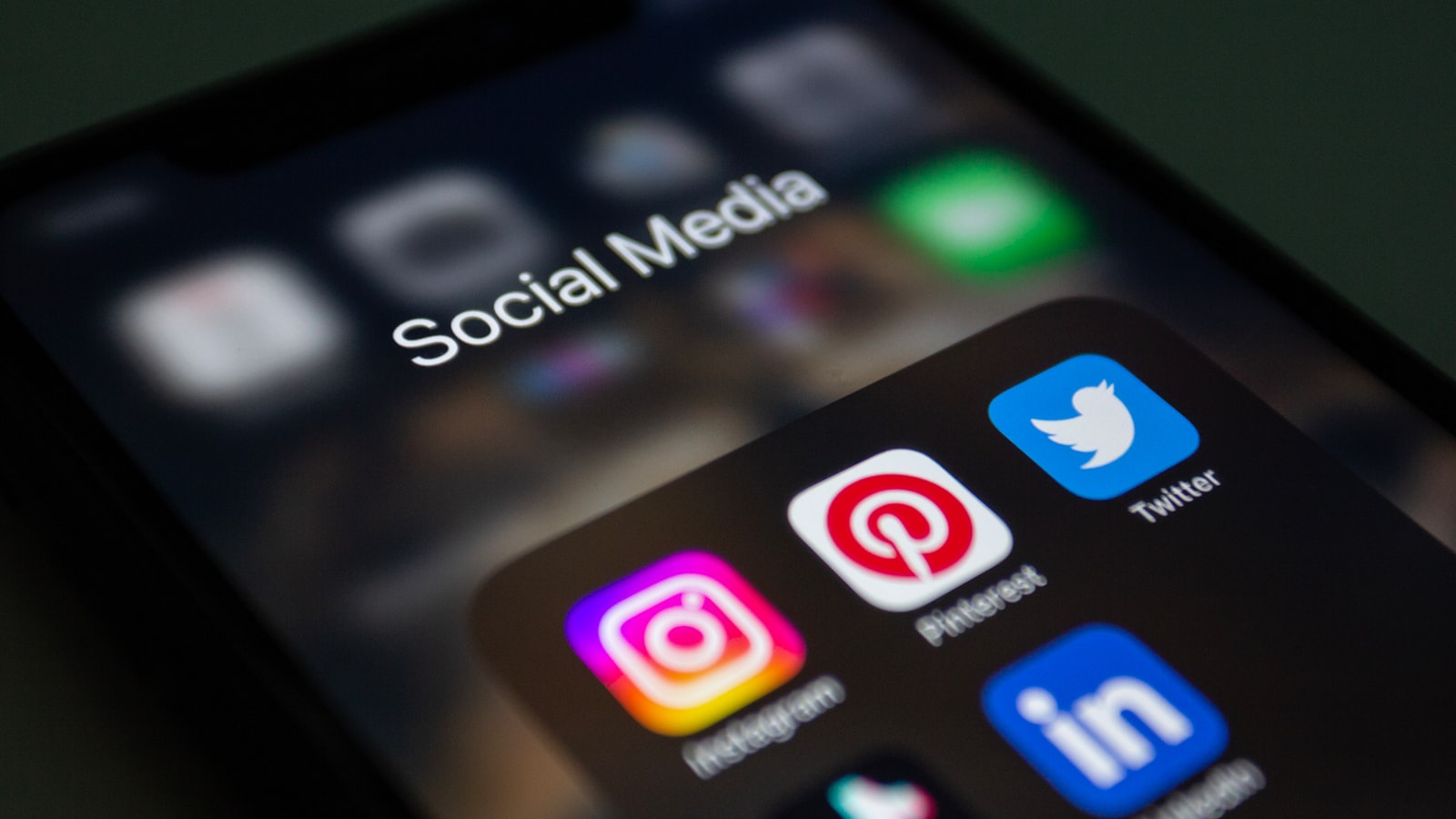 Instagram and other social media app icons on a phone home screen